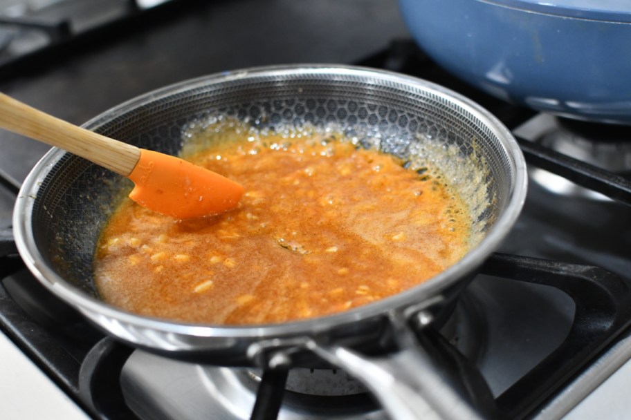 melting honey butter garlic in a skillet