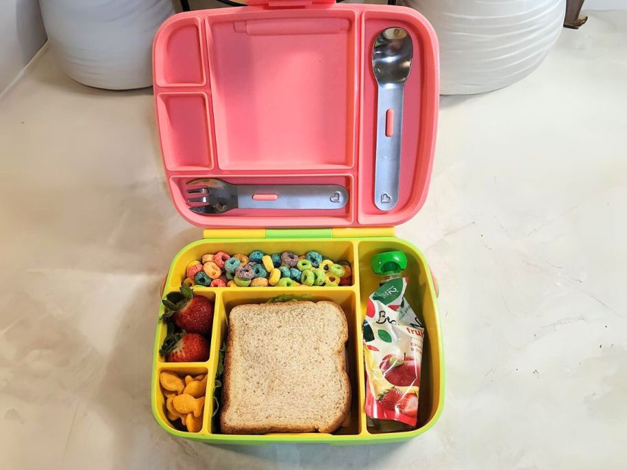 pink bento box on kitchen counter 