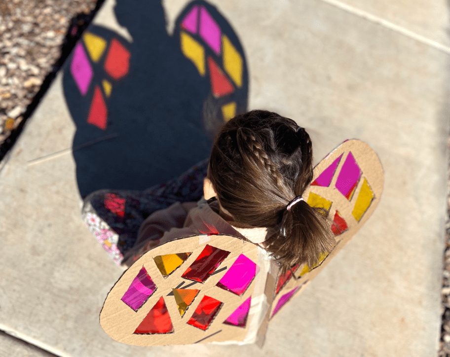 girl with sun catcher butterfly