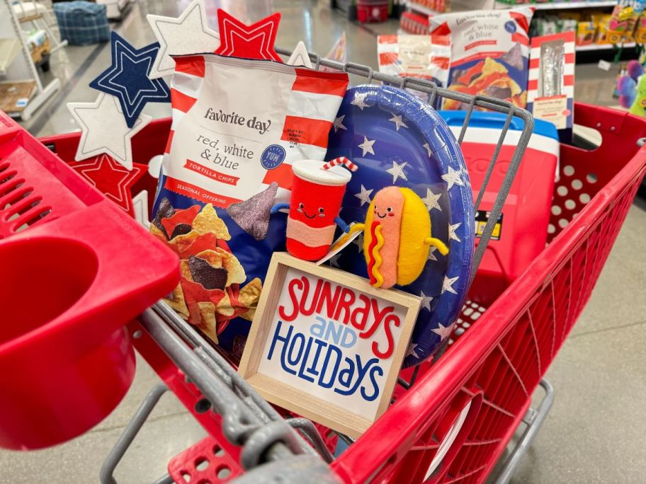 A target cart filled with 4th of July decor and toys 