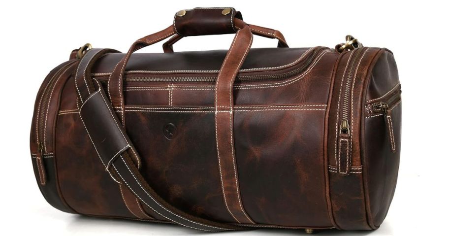 A leather barrel duffle bag