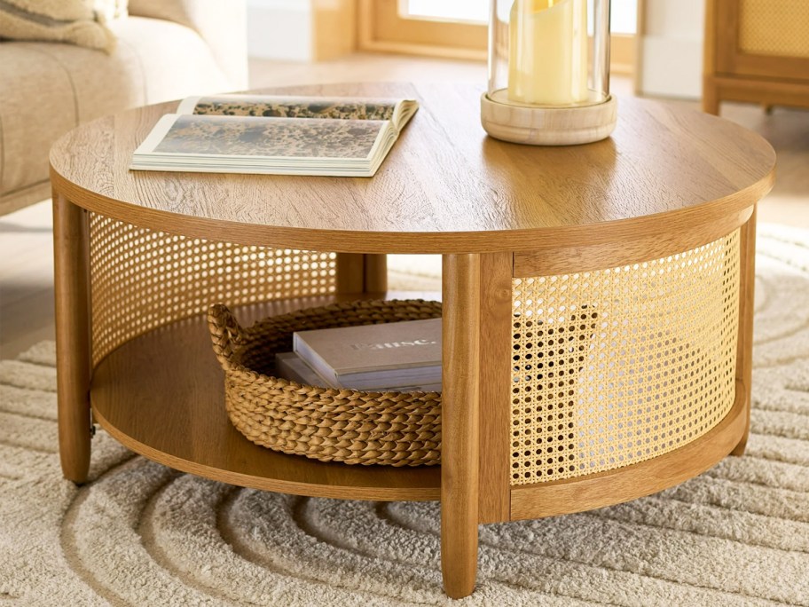 round wood coffee table with cane sides