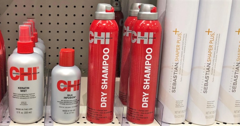 red bottles of CHI Dry Shampoo on store shelf