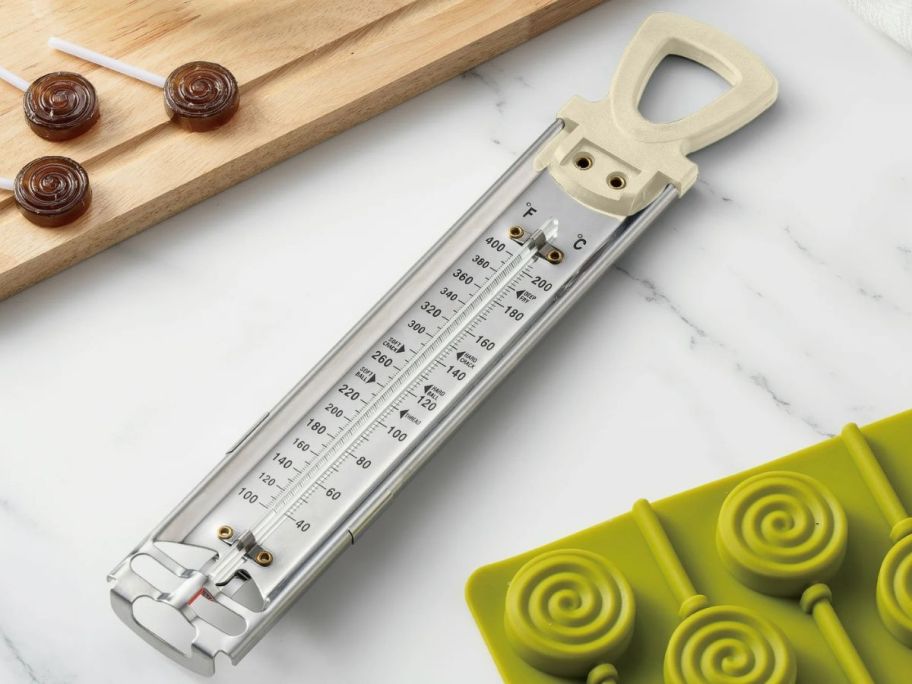 A candy thermometer on a counter