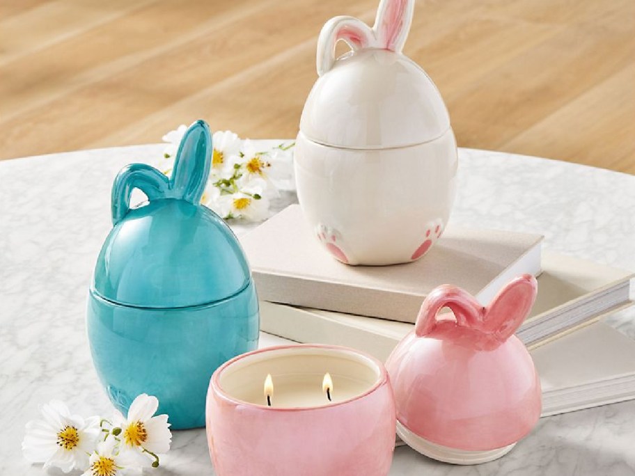 Member's Mark 2-Wick Bunny 20oz Candle displayed on the floor