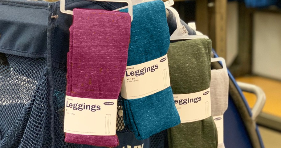 pairs of old navy leggings hanging from cart