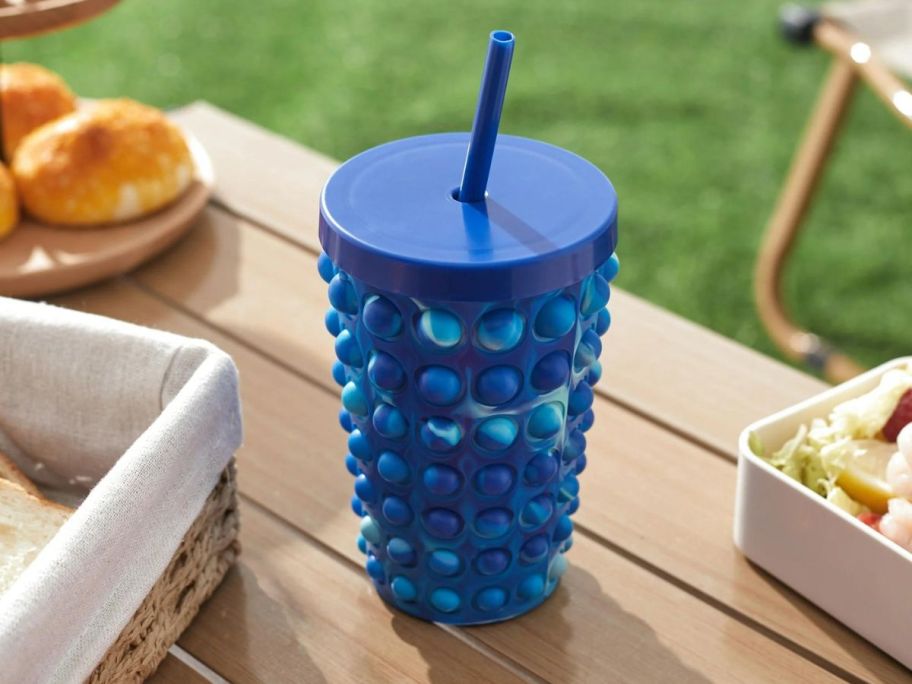 Blue Your Zone 16 oz Popit Water Tumbler on table