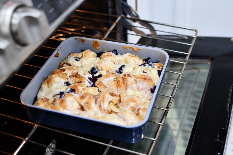 blueberry lemon cinnamon roll bake in the oven