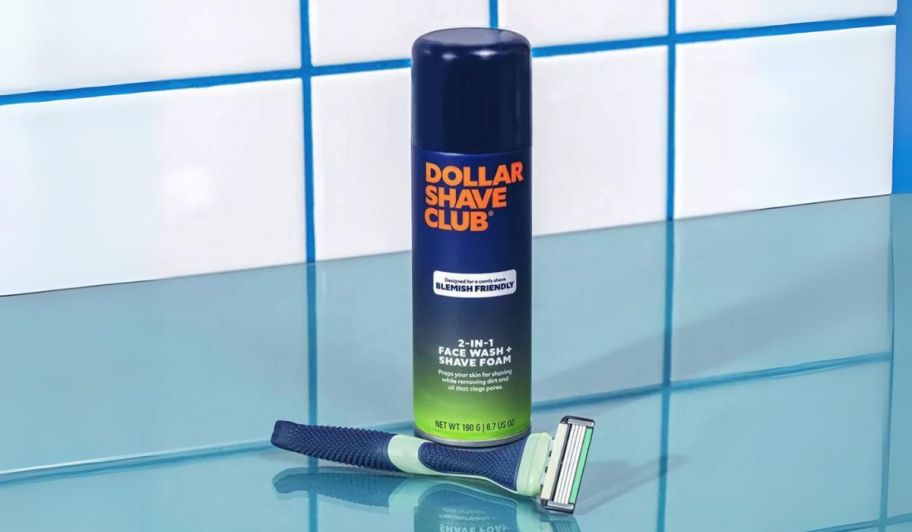 a can of shaving foam pictured with a razor