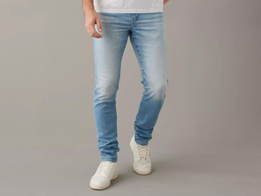 man wearing american eagle jeans