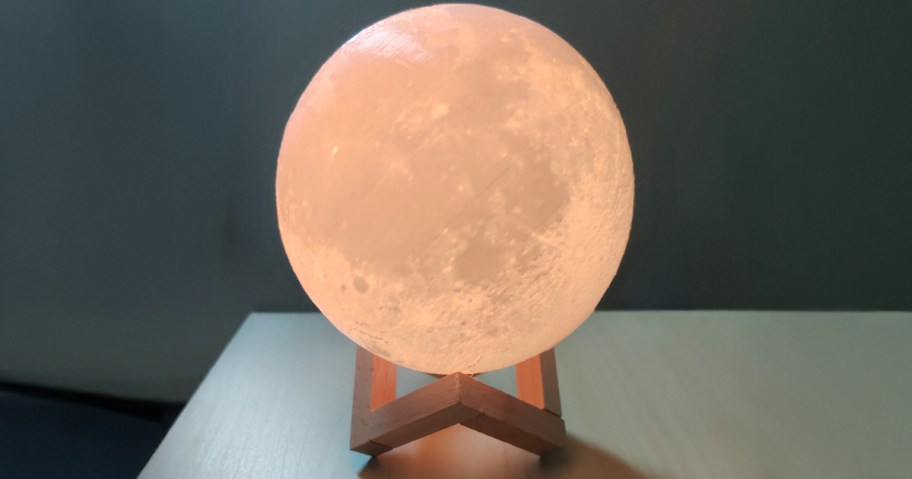 moon lamp sitting on a table