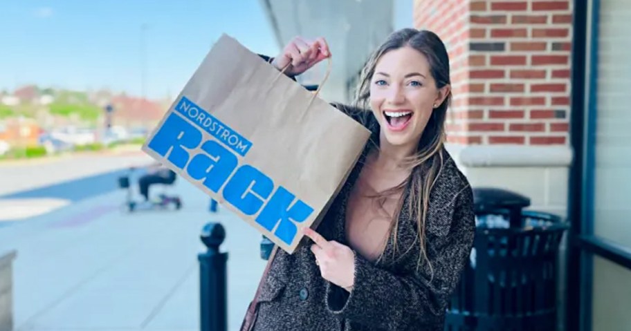 woman holding nordstrom rack bag