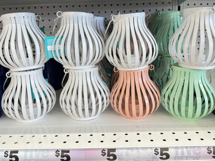 store display of metal lanterns with the price underneath