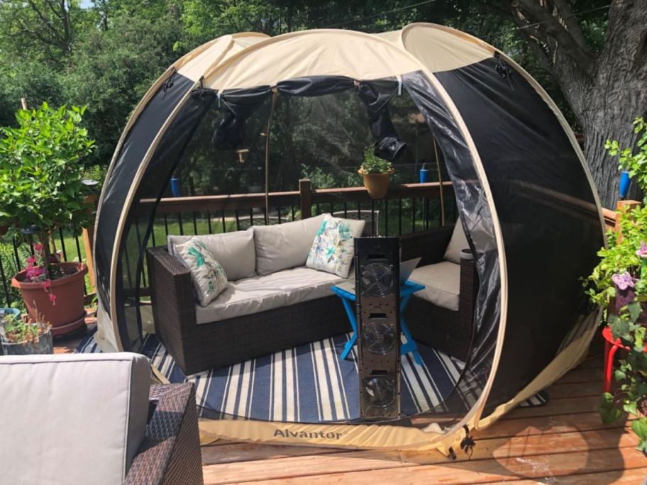 An Alvantor Pop Up Gazebo in a backyard