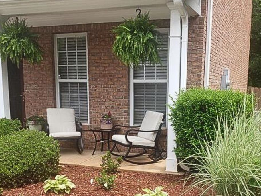 A patio with a Mosaic Patio set