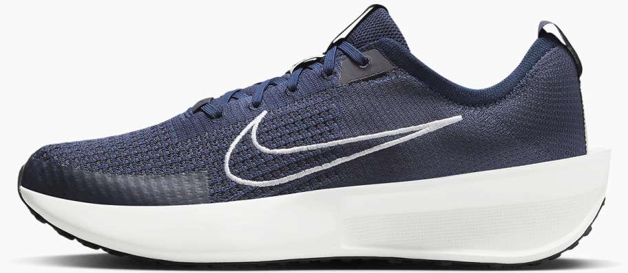 navy blue and white nike running shoe