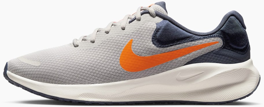 grey, blue, and orange nike running shoe