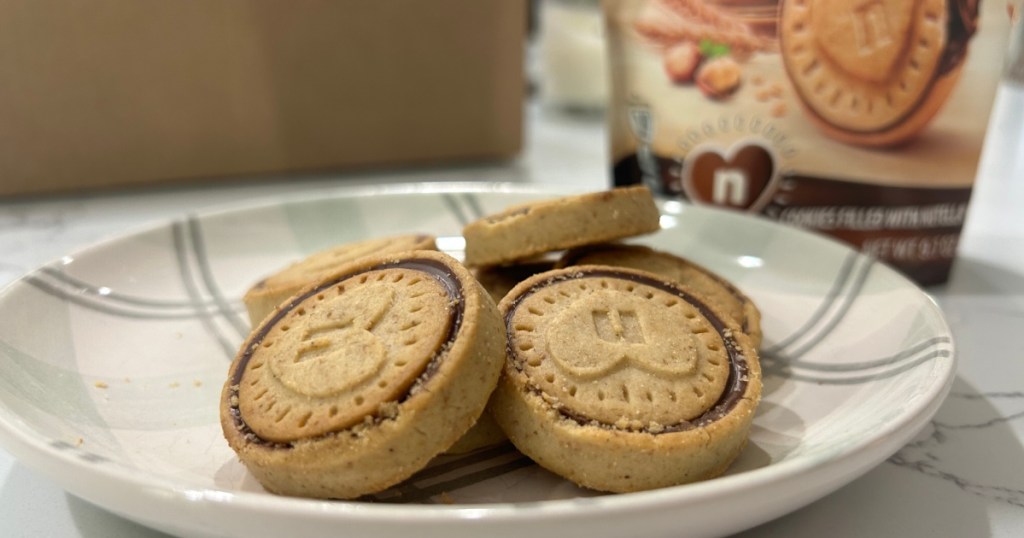 Nutella Biscuits on plate in front of bag