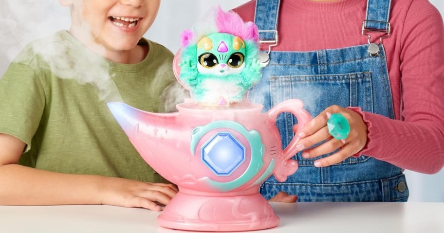 kids playing with a Magic Mixies genie lamp and plush toy