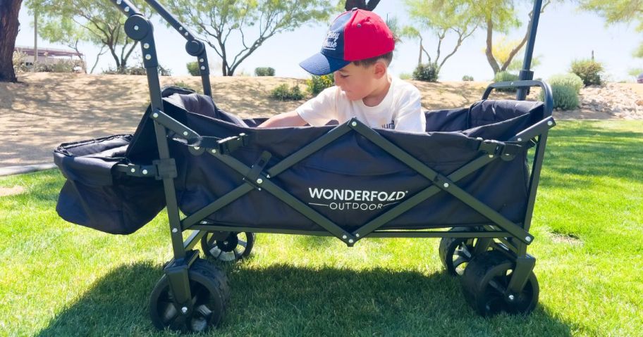 boy sitting in wonderfold wagon