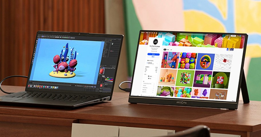 laptop and portable monitor sitting on table