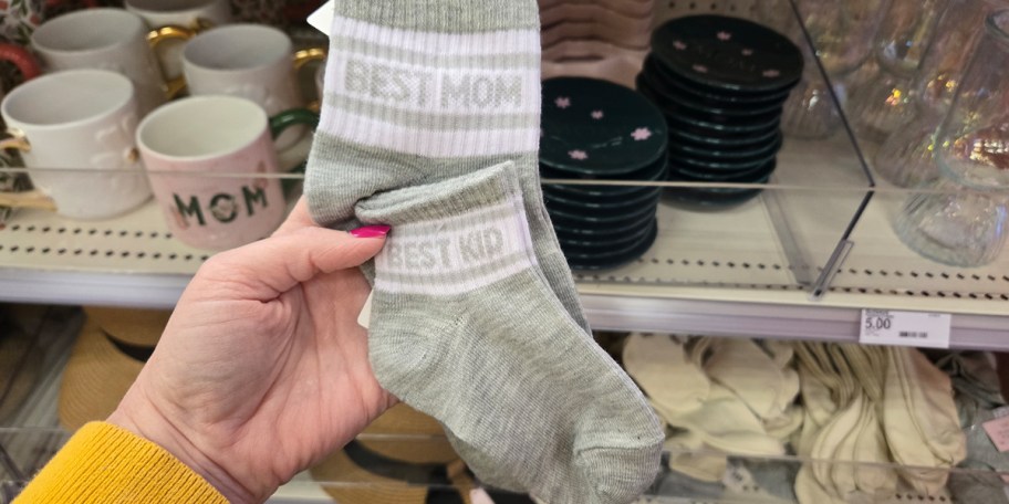 hand holding best mom socks 