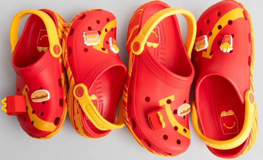 kids and adult red crocs with mcdonalds charms on them