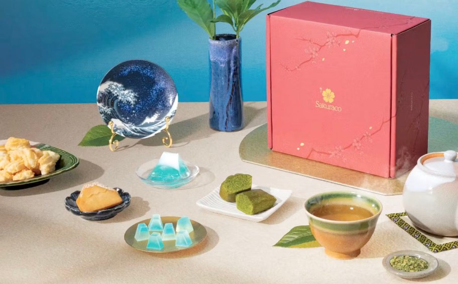 sakuraco box with treats, and teas on table