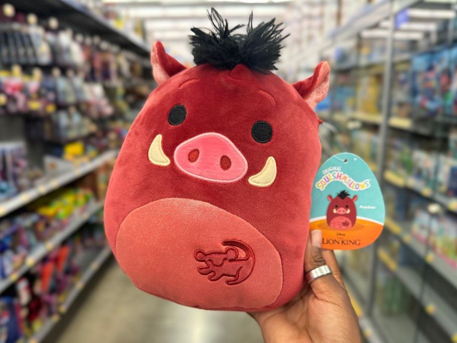 Squishmallows 8-Inch Disney Lion King Pumbaa in hand in store