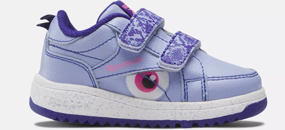 light purple reebok shoe with eyeball on side