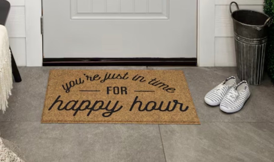 you're just in time for happy hour doormat on floor