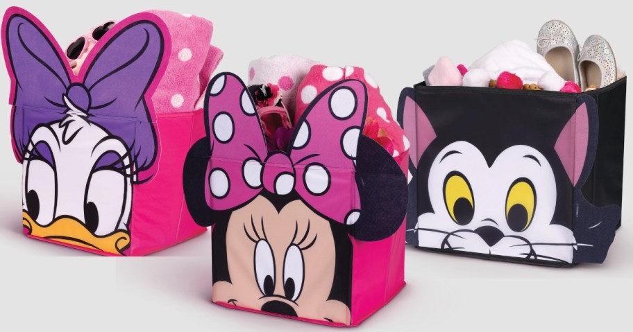 Daisy Duck, Minnie Mouse and Figaro cat storage bins with kids toys, clothes and items in them
