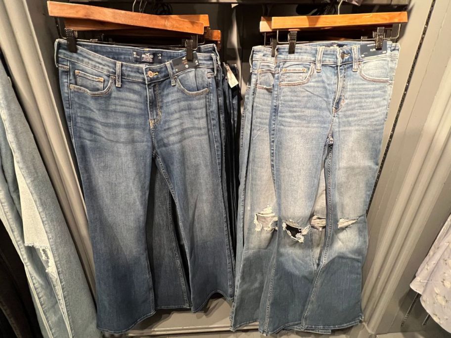 2 Pairs of Hollister Jeans on hangers at the store