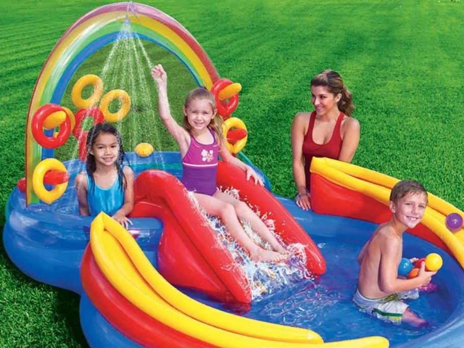 Kids playing in an inflatable pool