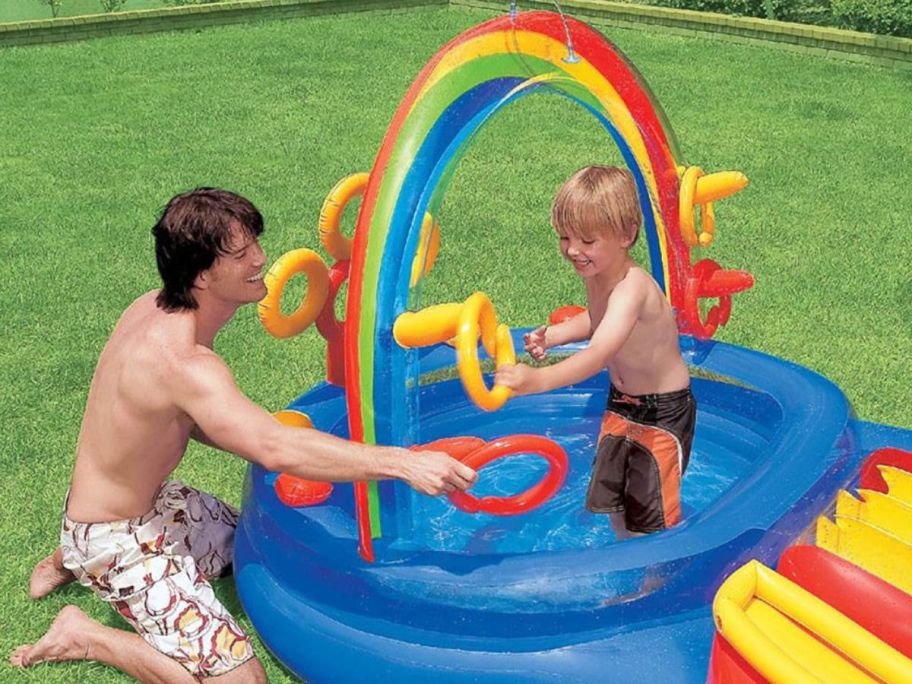 Kids playing in an inflatable pool