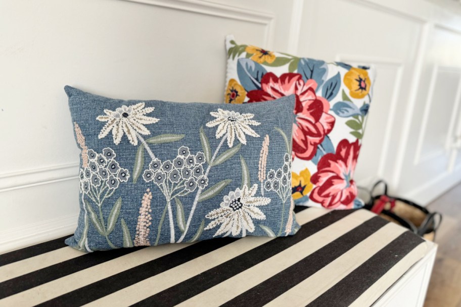 A Mainstays Chambray embroidered throw pillow from the Walmart home decor summer refresh section