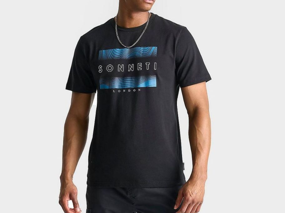 A man wearing a Sonneti London T-Shirt