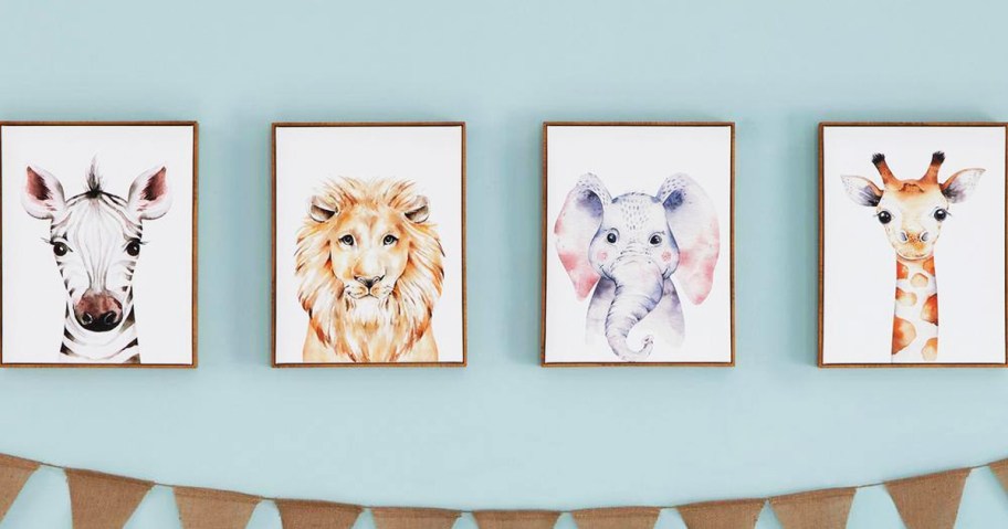 4 framed pieces of animal wall art in kids room