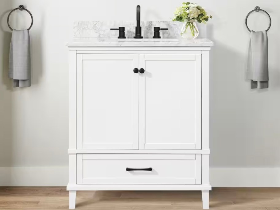 white bathroom vanity in bathroom 