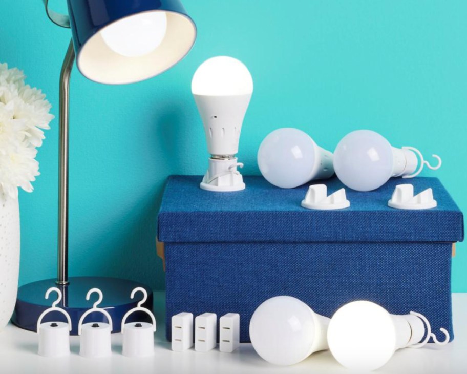 led light bulb next to desk lamp and bulbs