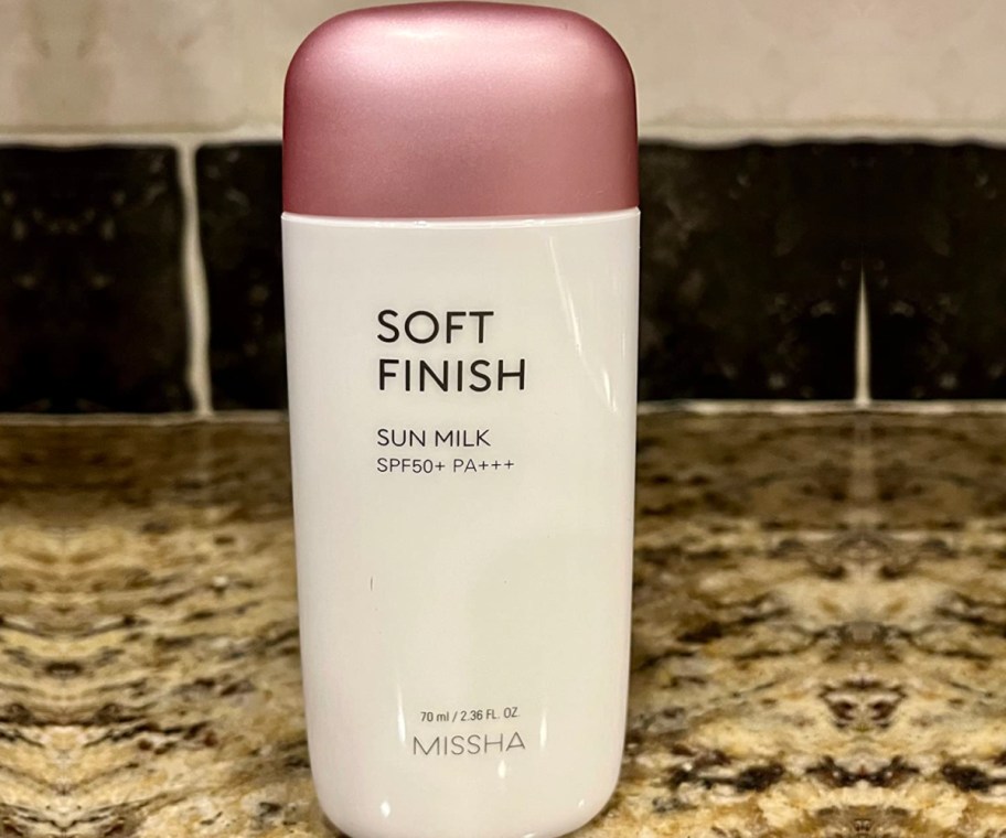 sunscreen with pink cap