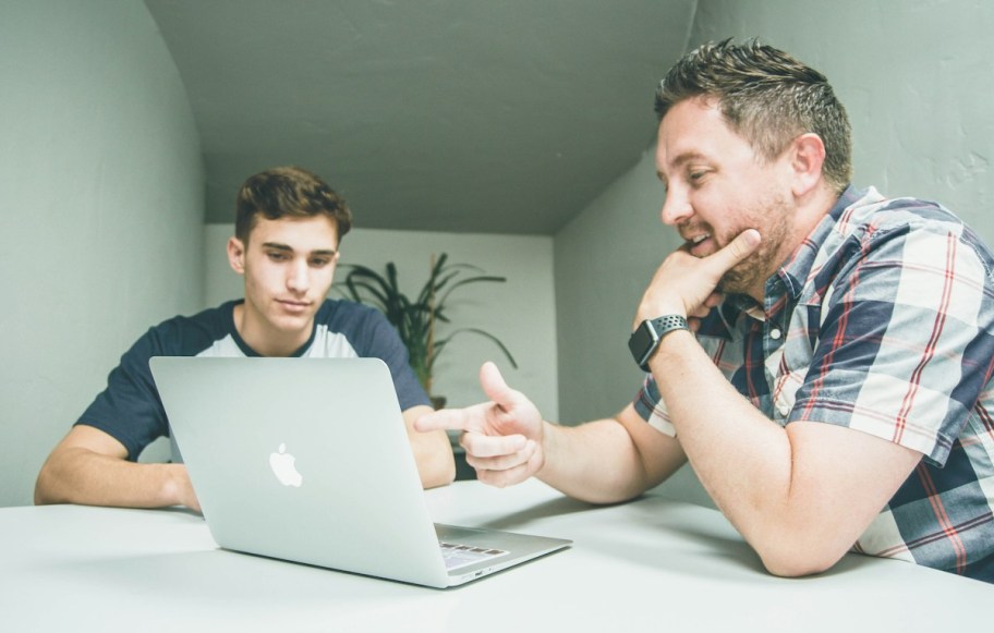 men on laptop making a lease agreement on rental investment property