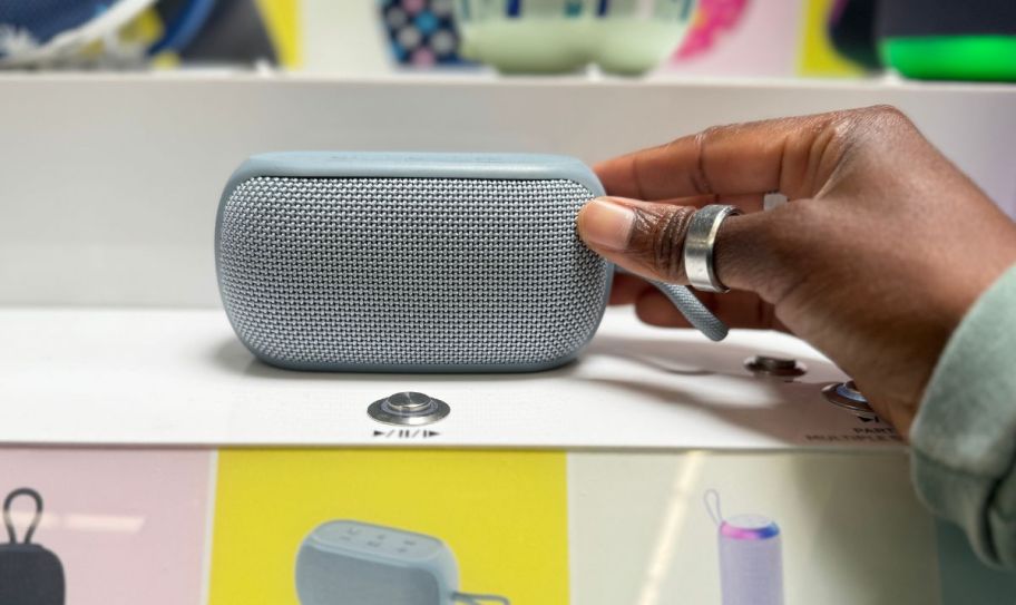 small light blue bluetooth speaker