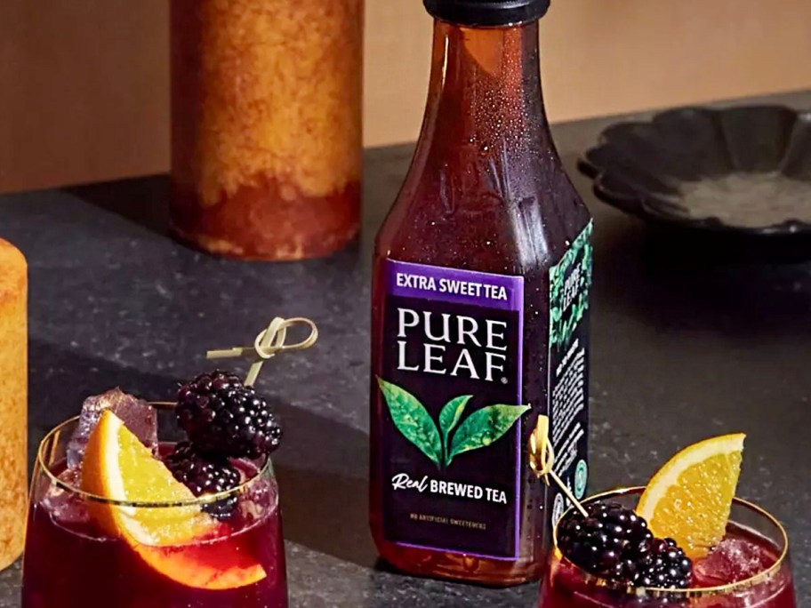 extra sweet pure leaf tea bottle sitting on table