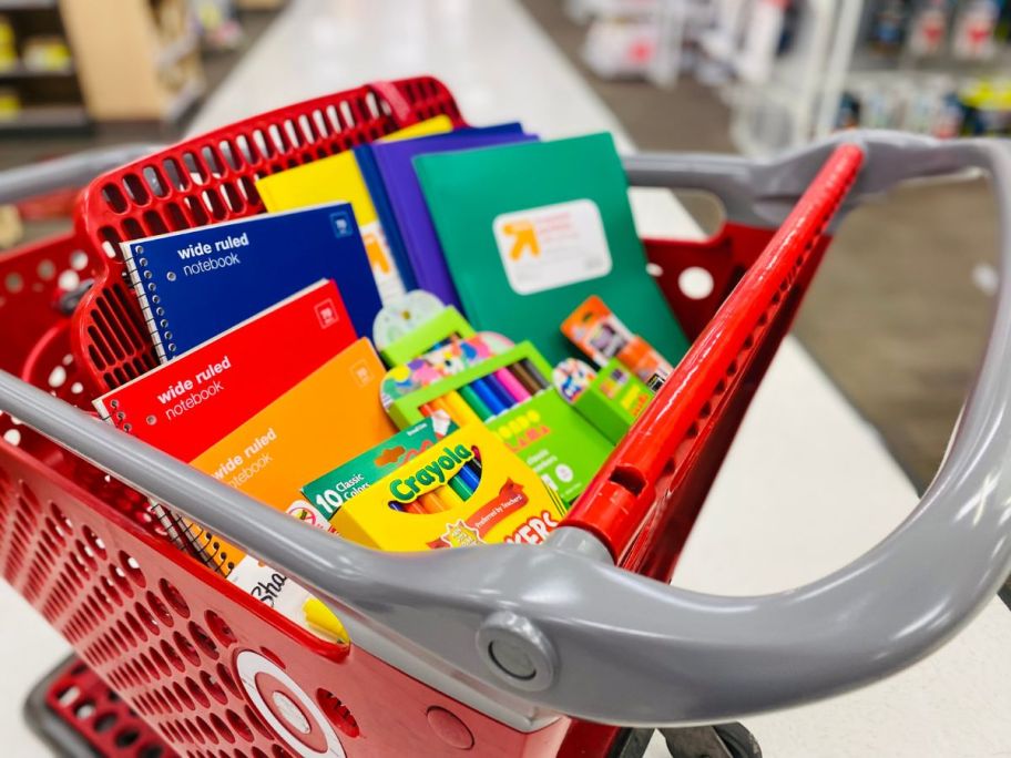 school supplies in cart at store