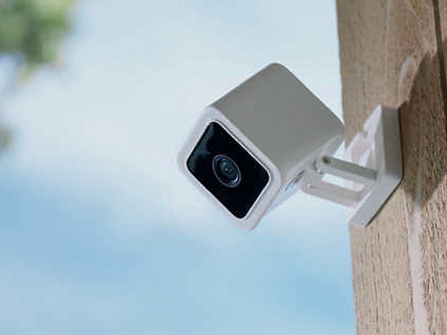 white wyze camera on wall 