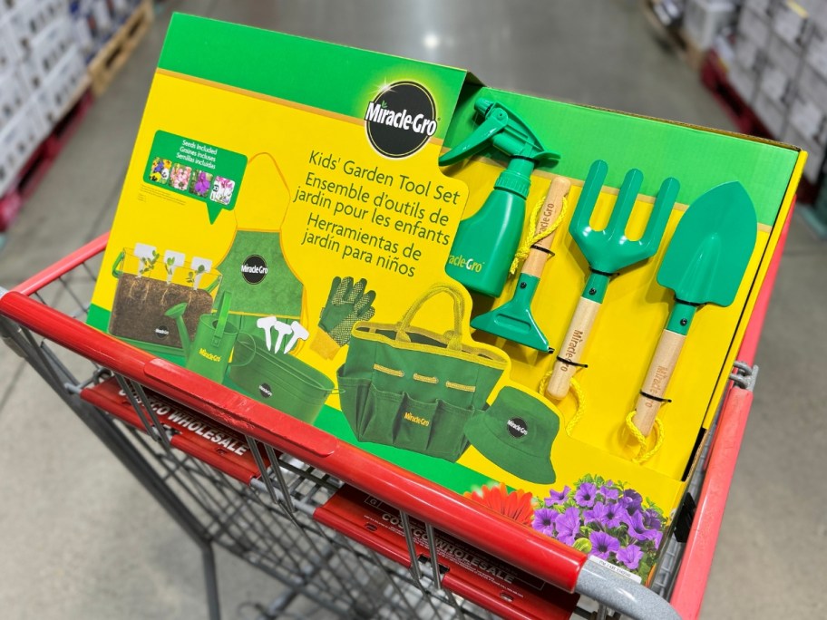 yellow and green box with a Miracle Gro Kids’ Garden Tool Set in a Costco cart