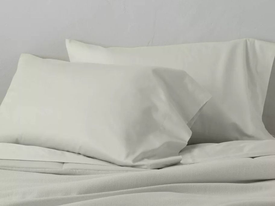 Casaluna 500 Thread Count Washed Supima Sateen Solid Pillowcase Set on bed