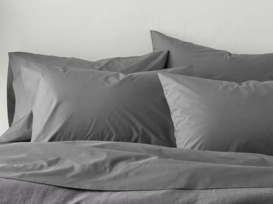 Casaluna Washed Supima Percale Solid Pillowcase Set on bed