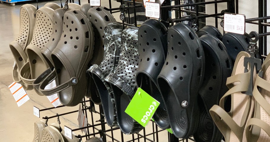 black and brown crocs clogs on display in store